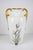 Exquisite early 20th-century porcelain vase, hand-painted with vibrant purple and pink irises. This elegant double-handled...