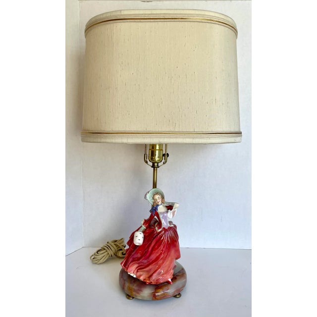 Here is a charming pair of Bone China female figurines made by Royal Doulton and mounted onto round onyx, natural stone...