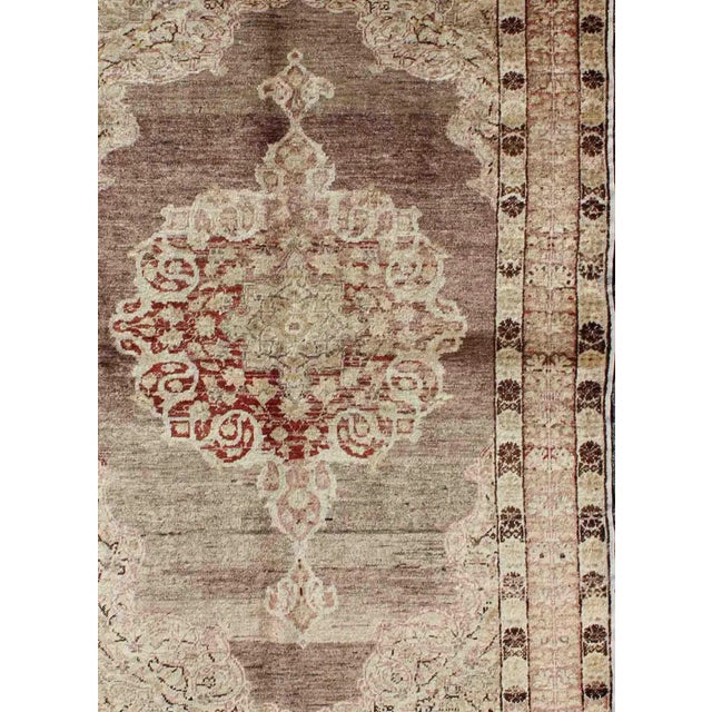 Measures: 4 x 6'3. Vintage Turkish Oushak Rug with Faded Plum and Cream Tones. Keivan Woven Arts / rug/NA-34,...