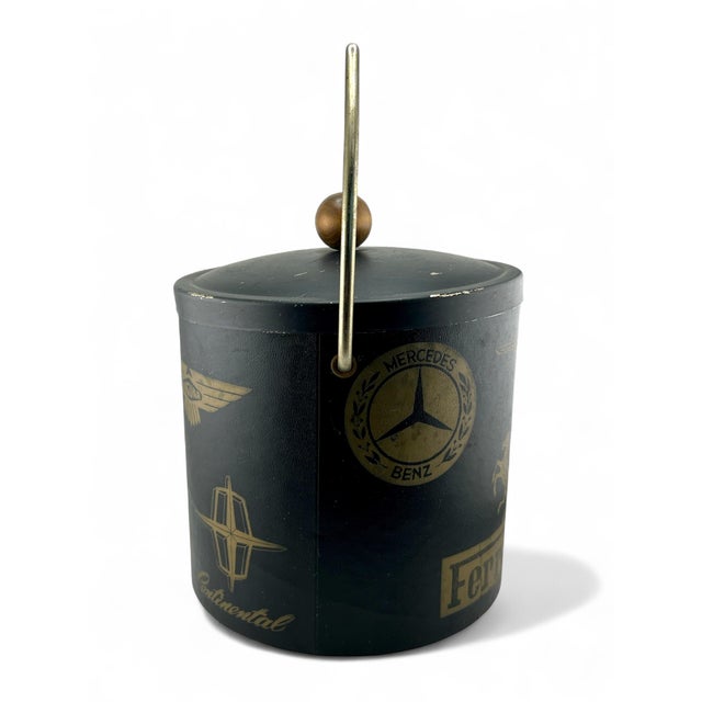 Rare find! Add to your bar for the luxury classic car person in your life! This ice bucket is made on metal, wrapped in...