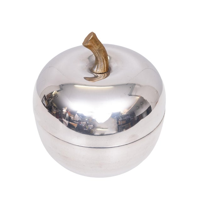 So typical 1970s, this Apple shaped Ice bucket. Polished aluminum signed. Made in Italy. Good condition.