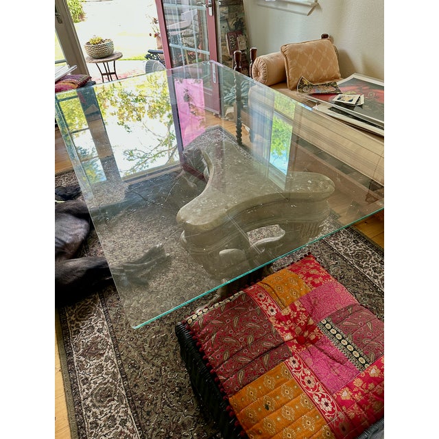 A striking pair of vintage sculptural dolphin table bases in a Mediterranean design popularized in the mid to late 20th...