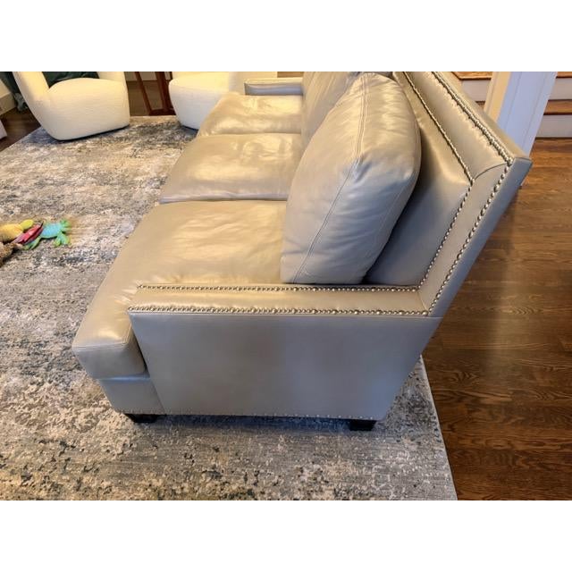 A high-end Leathercraft sofa in soft grey leather, purchased in 2018 through a design center and barely used since. Clean...