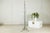 "About the Item This vintage wrought iron floor lamp features an elegant, elongated form accentuated by hand-forged...