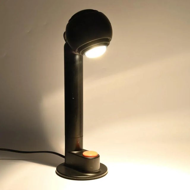 Black space age table lamp with magnet fitted globe. Designed by Schlagheck Schultes, made by Osram, branded by Siemens....