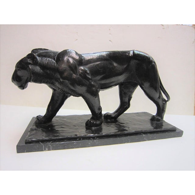 A rare and important French/ Italian Art Deco period bronze sculpture of a walking panther in original dark brown/ black...