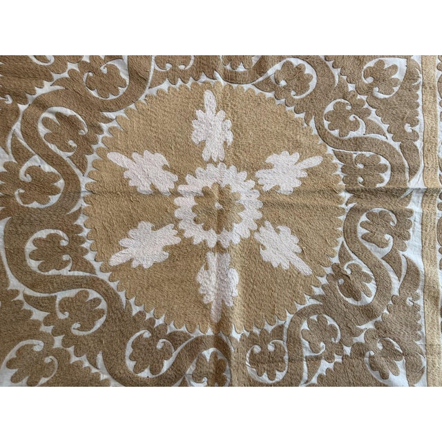Vintage Suzani from Uzbek, circa early 1960s. There are stains on this suzani. Dimension; 51'' x 54'' inches / 129 x 138...