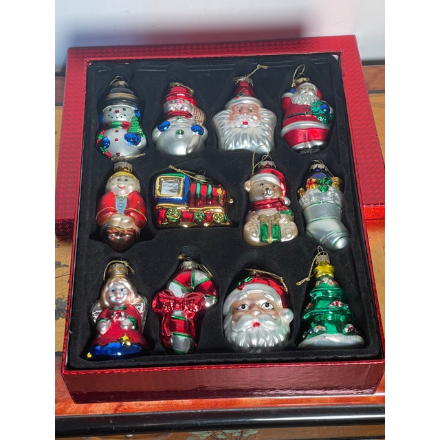 Gorgeous vintage Christmas ornaments 12 pcs set of figurines with Santa’s by Thomas Pacconi.