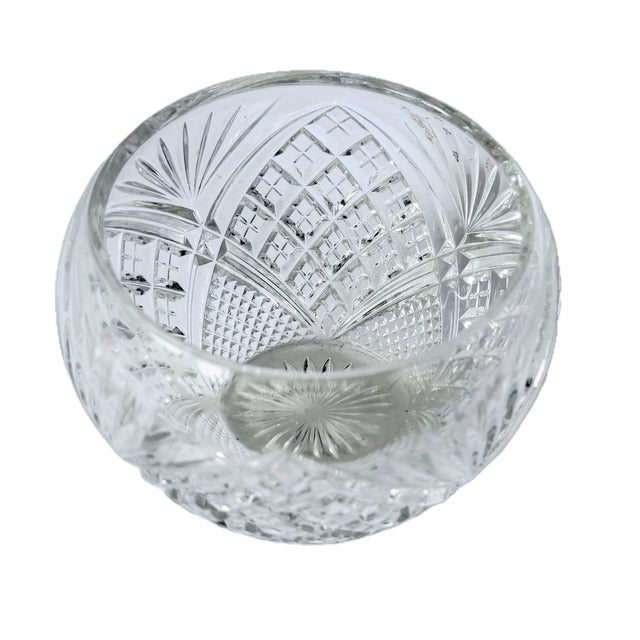 Small vintage cut crystal vase in an abstract lotus flower design with checkerboard accents. No maker's marks.