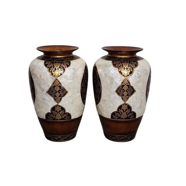 Stunning pair of vintage urnshaped floor vases, mandala pattern motif, mother of pearl/capiz shell bodies, both in...