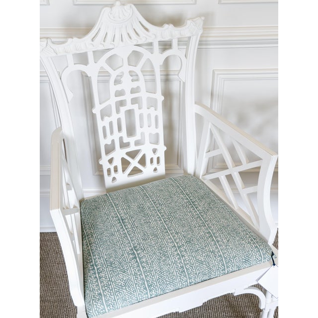 Pair of Chinese Chippendale style armchairs with white gesso finish and aqua colored Fermoie fabric. These chairs are...