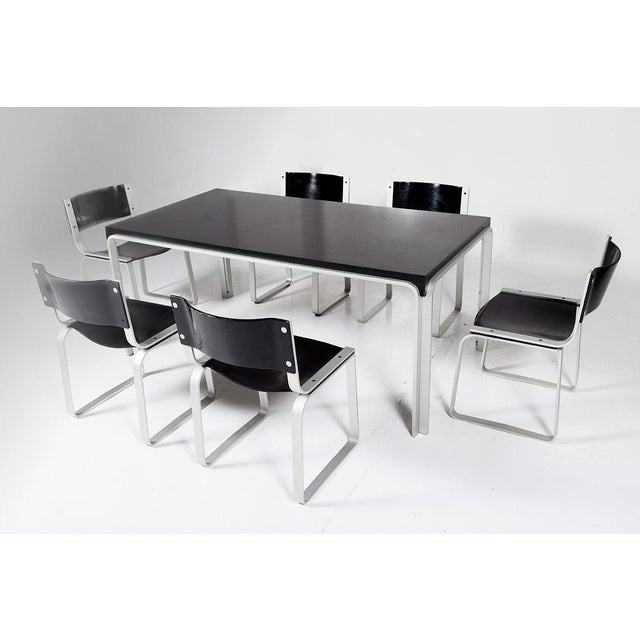 Pastoe dining set consisting of 6 chairs (type SM0301) an a matching table designed by Pierre Mazairac in 1972. The frames...