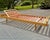 Vintage adjustable daybed by Swiss maker Hasena, featuring a warm wood frame, tapered legs, and an articulated backrest...