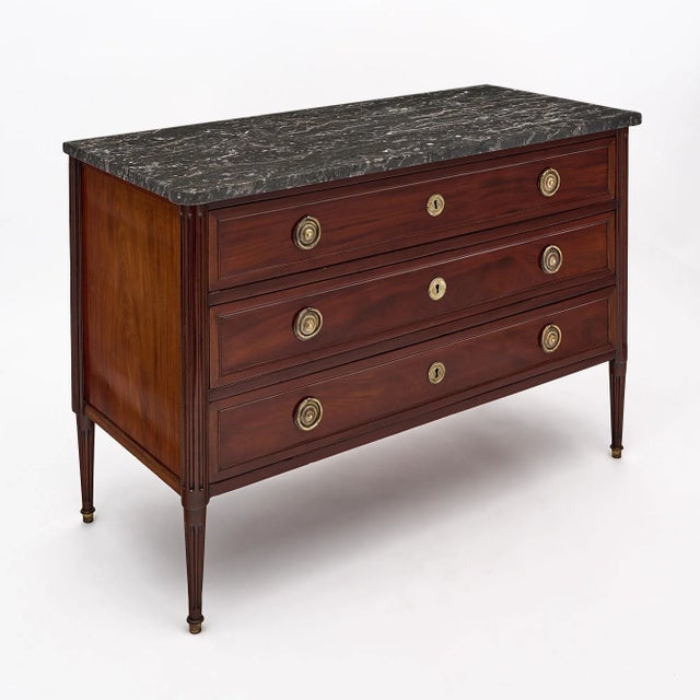Chest, French, from the Louis XVI period made of mahogany that has been finished with a lustrous French polish. This...