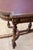 This hand-carved Louis XVI-style bureau plat features gold-painted details throughout and fluted, tapered legs. The red...