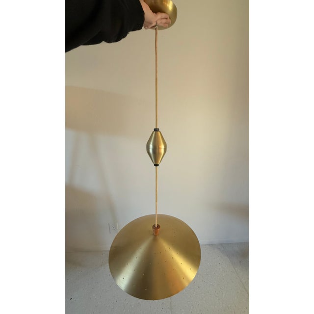 Stunning MCM pull down pendant made by Imperialites. Pulls down an additional 26”. In wonderful shape with only some...