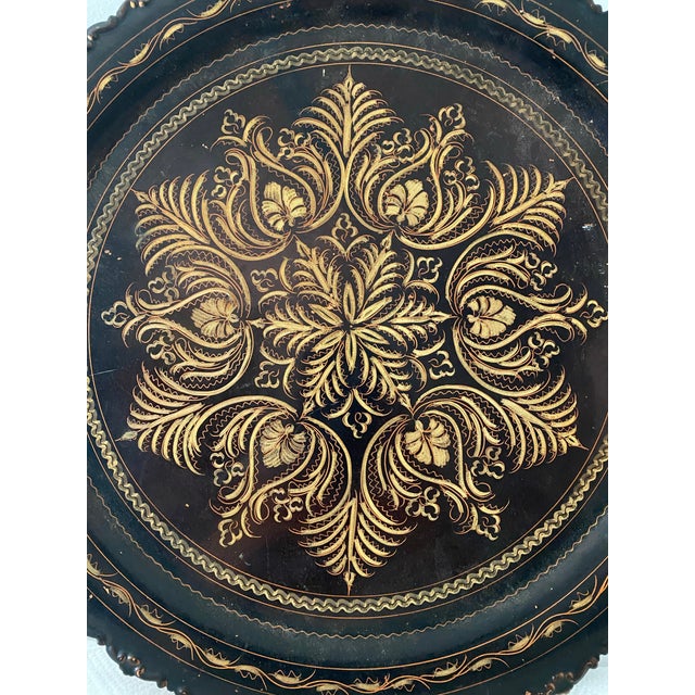 A very beautiful and intricately etched solid copper tray with a hanging loop on the back to bring beauty and interest to...