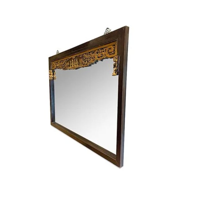 Asian 1960s' Vintage Mirror is made out of elm wood. It is all hand carving with golden hand carving panel at the top. It...