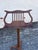 Vintage Wooden Adjustable Lyre Music Stand with Tripod Base. This music stand features warm wood finish, turned details to...