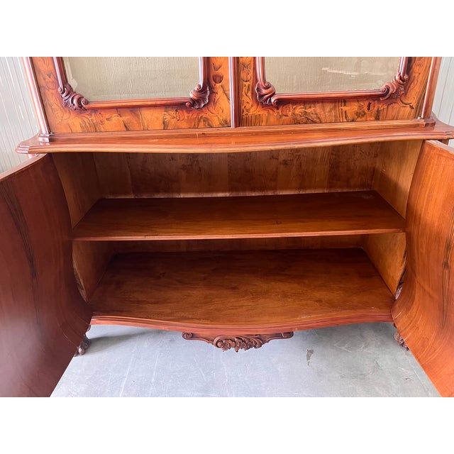 Louis xv wooden display cabinet, slightly curved at the bottom early 20th century, with glass doors and a double shelf...