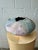 A substantial hand-built studio pottery vessel by Gail Markiewicz, distinguished by its organic form and richly textured...