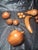 Unique carved wood pieces of fruit consisting of a banana, a large & small apple, pear, lemon, grapes & a couple more,...