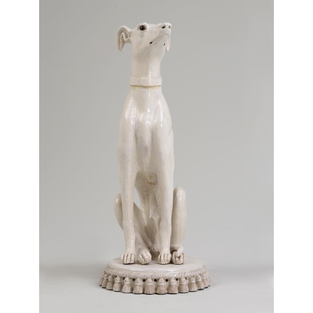 Although we are serious dog lovers, we typically would not purchase one of these common large white Whippet sculptures. As...