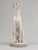 Although we are serious dog lovers, we typically would not purchase one of these common large white Whippet sculptures. As...