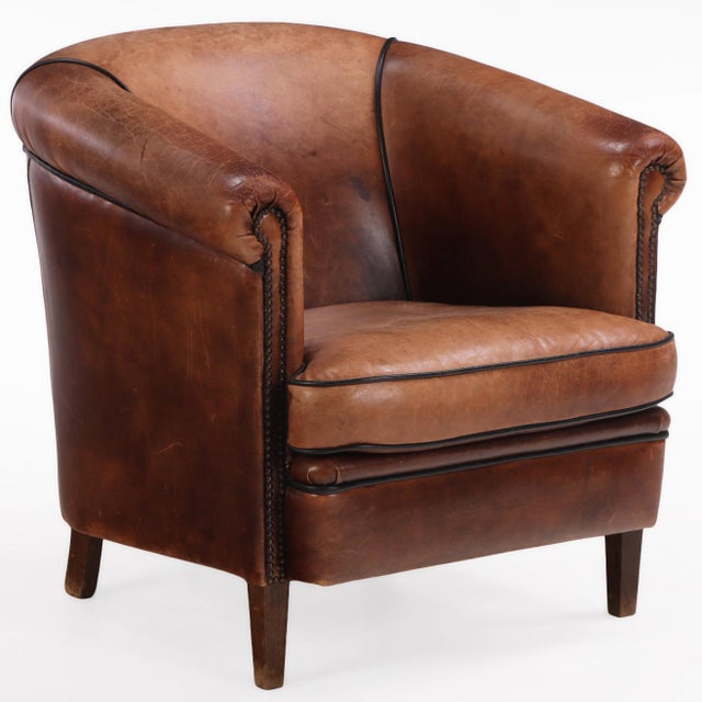 With a vertically tufted backrest that adds both visual interest and supportive comfort, this chair’s classic, deep seat...