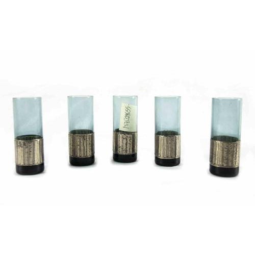 Set of five shot glasses for Liqueur is an original decorative set of objects realized in the 1970s. Original fumè glass...