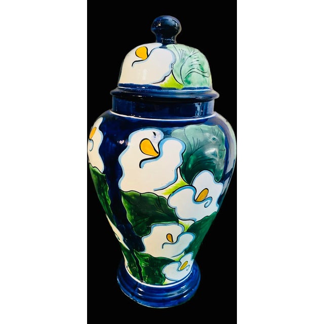 A fantastic Talavera hand painted ginger jar. Also makes a great vase for your fresh flowers. Dark blue & green with big...