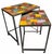 Distinctive vintage industrial nesting tables featuring tops crafted from reclaimed painted metal signage fragments...