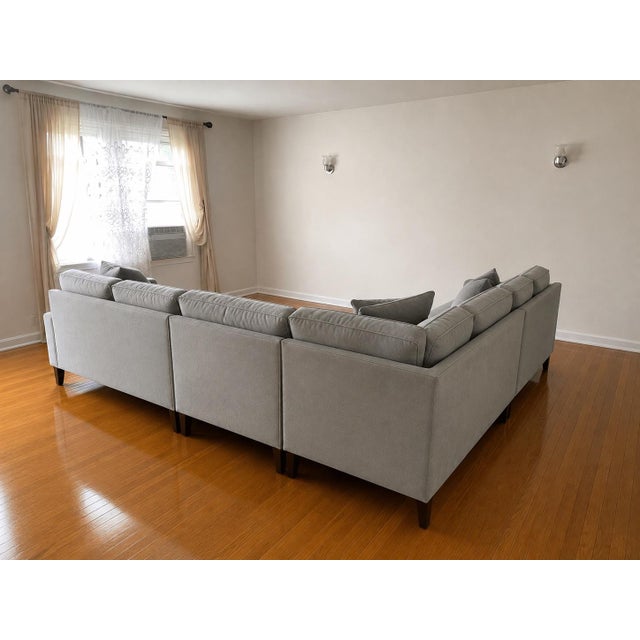 Contemporary 3-piece sectional sofa with cuddler chaise, purchased new in 2022 from an upscale furniture retailer...