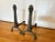 A beautifully detailed pair of antique cast iron andirons (or firedogs) made by The Ohio F & M Co., an Ohio foundry active...