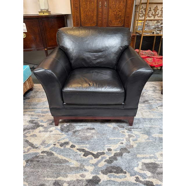 Design Plus Gallery presents the Keeler Lounge Chair from Stickley. The chair is made in the brands smooth, fine black...