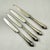 A set of four silver plate fruit or dessert knives, showing the hallmarks for Walker & Hall, Sheffield, England circa...