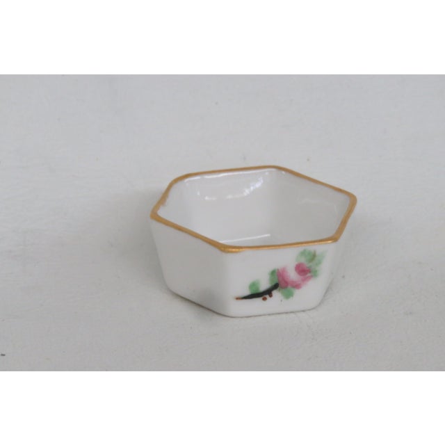 This darling Hexagonal Spice Cellar is made of porcelain. This lovely cellar is perfect for serving any spice of your...