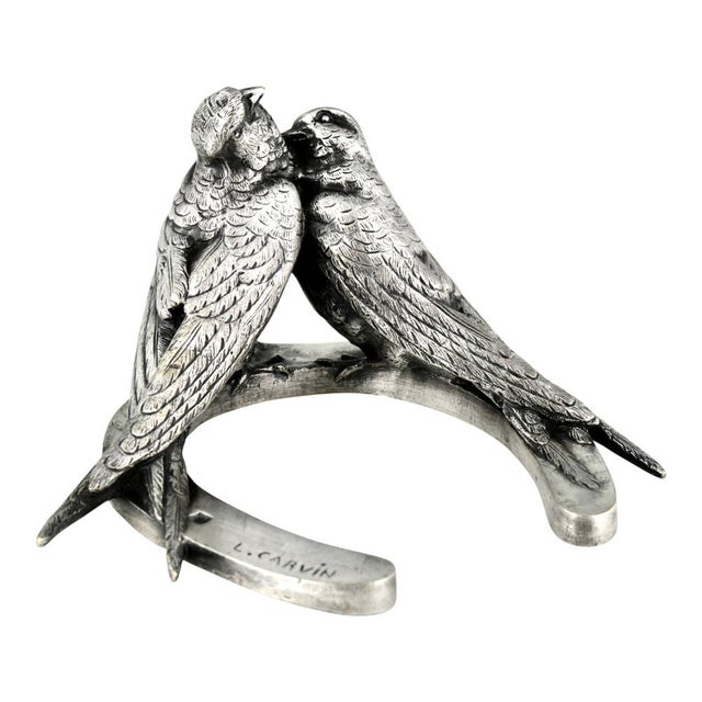 Art Nouveau bronze sculpture of a pair of swallows on a horseshoe by Louis Albert Carvin. Silvered bronze. France, 1900....