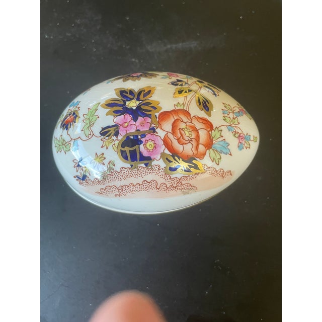 Vintage Mason's Ironstone egg-shaped lidded trinket box featuring a colorful floral and Chinoiserie-inspired pattern with...