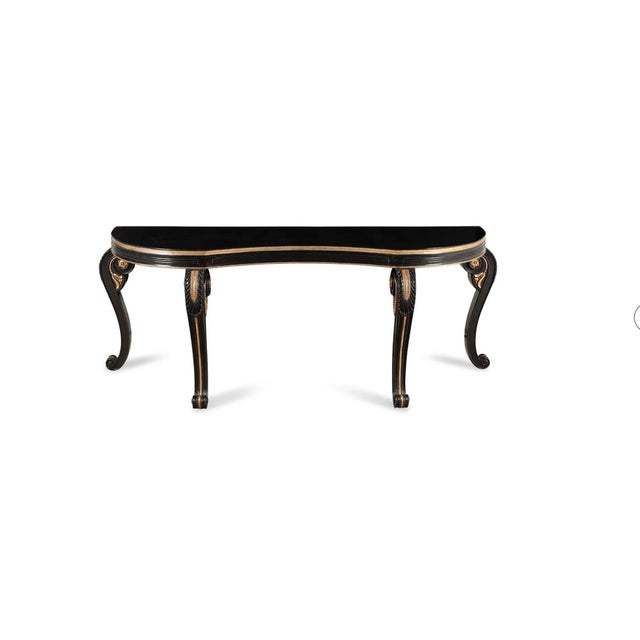 90.5ʺW × 28.5ʺD × 34.5ʺH An exceptional console table by **Dessin Fournir**, featuring an elegant black finish accented by...