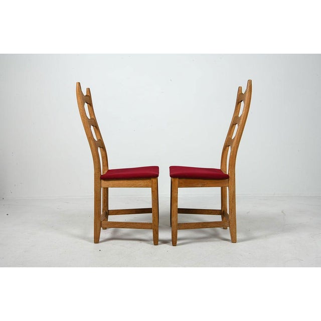 Henning Kjaernulf Ten Oak Dining Chairs Attributed to Henning Kjaernulf - 1970s For Sale - Image 4 of 10