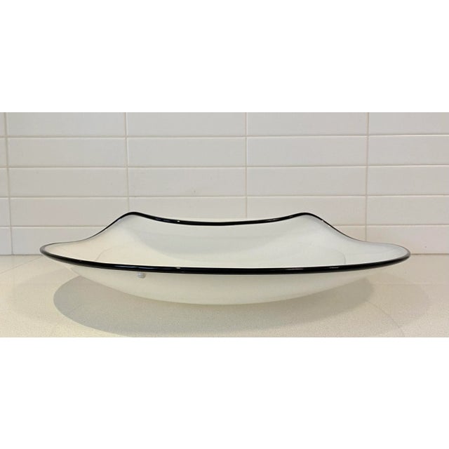 A stunner. Rare to have something of this scale and clarity. Evokes the cool Armani era of the 1980's when Italian design...