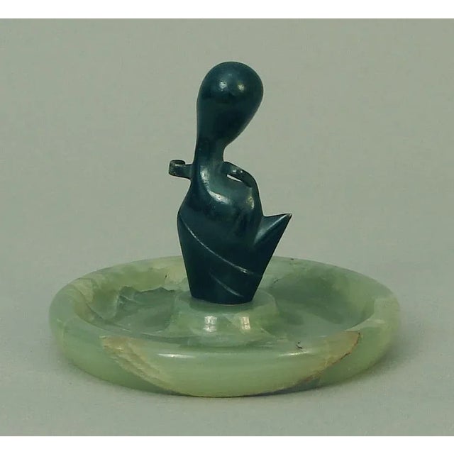 Signed “Austria.” Behold this particularly exquisite, sculptural bronze on onyx by mastercrafting Austrians, a highly...