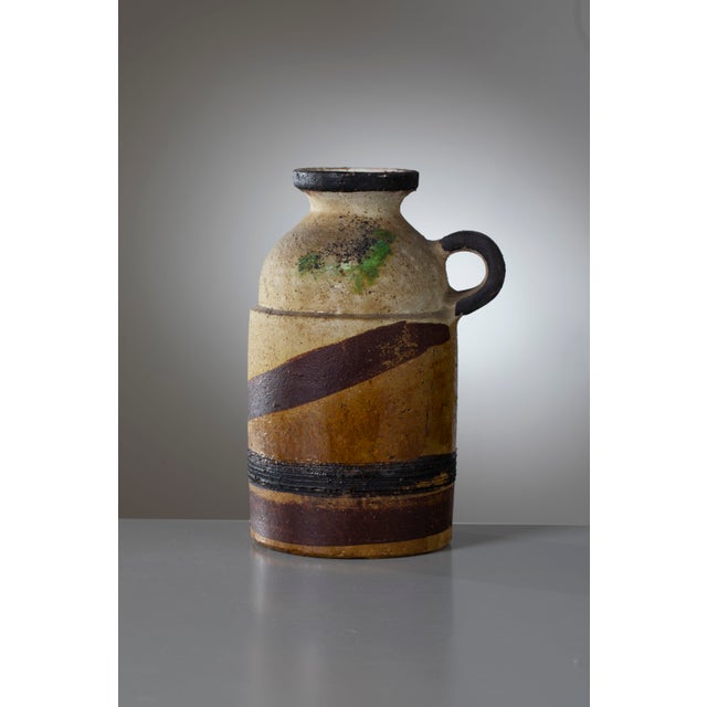 A powerful and highly textural studio pottery vase, designed by Ivo De Santis for the renowned workshop "Gli Etruschi" in...
