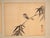 This antique Japanese two-panel screen is a byōbu in harimaze mounting, with pasted ink paintings on the ground. It...