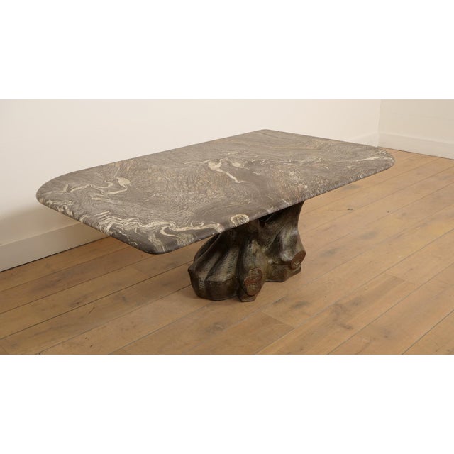 This stunningly beautiful asymmetrical vintage marble coffee table is a real eye-catcher. The beautiful veining in the...
