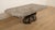 This stunningly beautiful asymmetrical vintage marble coffee table is a real eye-catcher. The beautiful veining in the...