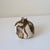 Vintage handmade studio pottery bud vase featuring a sculptural rounded bottle form with a narrow neck and richly layered...