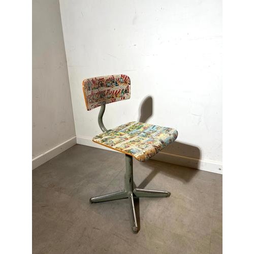 Unique and playful vintage stool or side table featuring a colorful comic strip print top. A real eye-catcher that adds...