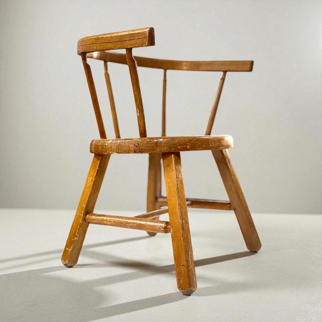 Vintage danish children’s chair produced in denmark during the 1950s. the chair is executed in solid beech with turned...